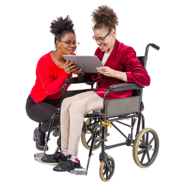 A woman helping a woman in a wheelchair use a tablet