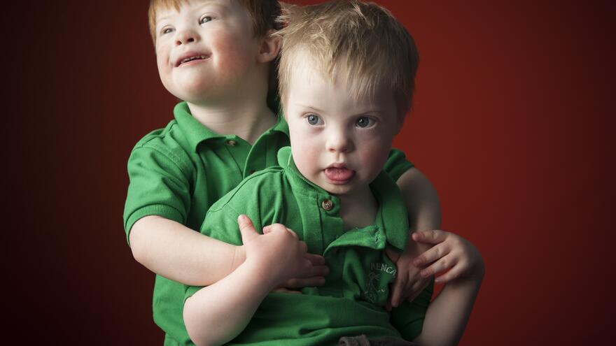 Two young boys sat together