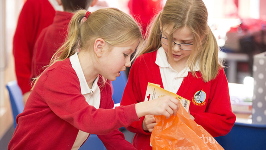 Schoolchildren crafting in classroom