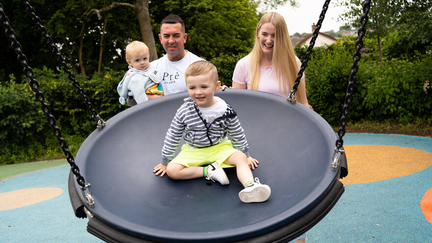 Parents playing with children