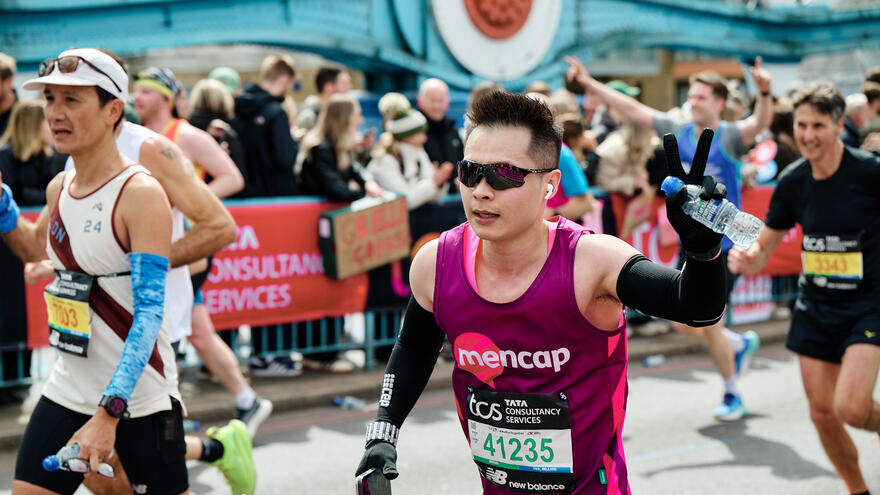 Mencap runner waving