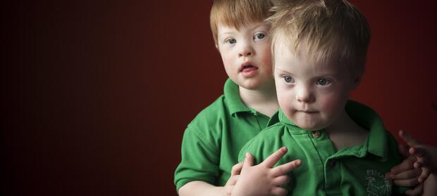 Two young boys sat together